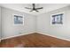Bright bedroom with hardwood floors and ceiling fan at 1120 Starline Se Dr, Smyrna, GA 30080