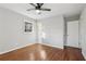 Well-lit bedroom featuring hardwood floors and closets at 1120 Starline Se Dr, Smyrna, GA 30080