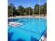Large, inviting community pool with plenty of lounge chairs at 1120 Starline Se Dr, Smyrna, GA 30080