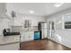 Modern kitchen with white cabinets, stainless steel appliances, and granite countertops at 1120 Starline Se Dr, Smyrna, GA 30080