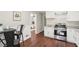 Bright kitchen offering updated appliances and view into the living room at 1120 Starline Se Dr, Smyrna, GA 30080