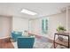 Inviting finished basement with comfortable armchairs, a walk out door and lots of light at 1120 Starline Se Dr, Smyrna, GA 30080