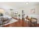 Cozy living room with hardwood floors and access to kitchen at 1120 Starline Se Dr, Smyrna, GA 30080