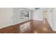 Bright and airy living room featuring hardwood floors and a large window at 1120 Starline Se Dr, Smyrna, GA 30080