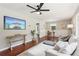 Open-concept living area with a ceiling fan and an abundance of natural light at 1120 Starline Se Dr, Smyrna, GA 30080