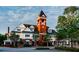 Quaint town center with a clock tower and various shops at 1120 Starline Se Dr, Smyrna, GA 30080