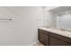 Bathroom features double vanity and a combination tub and shower at 12 Enclave Blvd, Covington, GA 30014