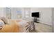 Bright bedroom with large windows and wood-look floors at 12 Enclave Blvd, Covington, GA 30014
