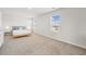 Spacious bedroom with neutral carpeting and natural light at 12 Enclave Blvd, Covington, GA 30014