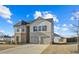 Two-story house with brick and siding, two-car garage, and a spacious driveway at 12 Enclave Blvd, Covington, GA 30014