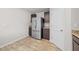 Kitchen boasts stainless steel refrigerator and wood-look flooring at 12 Enclave Blvd, Covington, GA 30014