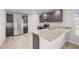 Kitchen with granite countertops, stainless steel appliances, and dark cabinets at 12 Enclave Blvd, Covington, GA 30014