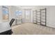 Bright home office with large windows and built-in shelving at 12 Enclave Blvd, Covington, GA 30014