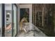 Private balcony features a wicker chair and provides a tranquil wooded view at 55 Serendipity Way, Atlanta, GA 30350