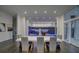 Elegant dining room with a modern table and statement lighting at 55 Serendipity Way, Atlanta, GA 30350