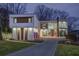 Modern two-story home with a sleek design and landscaped lawn at 55 Serendipity Way, Atlanta, GA 30350