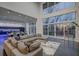 Spacious living room with a sectional sofa and access to backyard at 55 Serendipity Way, Atlanta, GA 30350