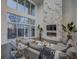 Spacious living room featuring a marble fireplace and large windows at 55 Serendipity Way, Atlanta, GA 30350