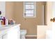 Bathroom with shower, toilet and white vanity at 2618 Windage Sw Dr, Marietta, GA 30008
