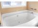 Bathroom featuring a large garden tub at 2618 Windage Sw Dr, Marietta, GA 30008