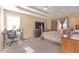 Spacious bedroom with carpeted floor and large TV at 2618 Windage Sw Dr, Marietta, GA 30008