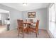 Dining room features wood table with four chairs at 2618 Windage Sw Dr, Marietta, GA 30008