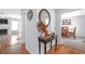 Bright entryway with hardwood floors, console table, and views into adjacent rooms at 2618 Windage Sw Dr, Marietta, GA 30008