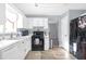 White kitchen features stainless steel appliances at 2618 Windage Sw Dr, Marietta, GA 30008