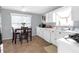 Kitchen with white cabinets, tile floor, and breakfast nook at 2618 Windage Sw Dr, Marietta, GA 30008