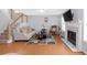 Spacious living room with hardwood floors, fireplace, and plenty of natural light at 2618 Windage Sw Dr, Marietta, GA 30008