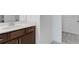 Bathroom features a single sink vanity with storage and view from window at 238 Lytham Se Dr, Mableton, GA 30126