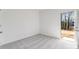 Bright bedroom with neutral carpet and an open door to the backyard at 238 Lytham Se Dr, Mableton, GA 30126