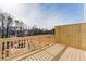 Beautiful wood deck with scenic views of the surrounding trees and landscape at 238 Lytham Se Dr, Mableton, GA 30126