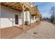 Back exterior of the house with a patio, AC units, and landscape at 238 Lytham Se Dr, Mableton, GA 30126