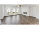 Spacious living room boasts an open floor plan, recessed lighting, and dark hardwood floors at 238 Lytham Se Dr, Mableton, GA 30126