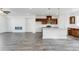 Spacious living room boasts an open floor plan, fireplace, and dark hardwood floors at 238 Lytham Se Dr, Mableton, GA 30126