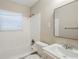 Clean bathroom with white tile and vanity at 2839 Allegro Nw Dr, Atlanta, GA 30318