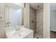 Small bathroom with shower and white vanity at 2839 Allegro Nw Dr, Atlanta, GA 30318