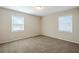 Charming bedroom with two windows and neutral carpet at 2839 Allegro Nw Dr, Atlanta, GA 30318