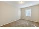 Spacious bedroom featuring neutral wall tones and plush carpeting at 2839 Allegro Nw Dr, Atlanta, GA 30318