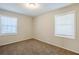 Spacious bedroom with neutral decor and carpet at 2839 Allegro Nw Dr, Atlanta, GA 30318