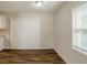 Simple dining area with hardwood floors and sliding door at 2839 Allegro Nw Dr, Atlanta, GA 30318