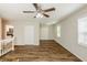 Living room with hardwood floors and access to kitchen at 2839 Allegro Nw Dr, Atlanta, GA 30318
