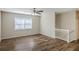 Spacious living room with hardwood floors and ceiling fan at 2839 Allegro Nw Dr, Atlanta, GA 30318