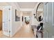 Bright and airy entryway with bench and mirror at 3219 Shirecrest Ln, Dacula, GA 30019