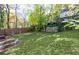 Large backyard with grass and trees at 516 Arthur Sw St, Atlanta, GA 30310