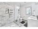 Modern bathroom with marble shower and double vanity at 516 Arthur Sw St, Atlanta, GA 30310