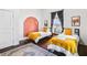 Bedroom with two twin beds and a colorful rug at 516 Arthur Sw St, Atlanta, GA 30310