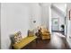 Bright entryway with hardwood floors and seating at 516 Arthur Sw St, Atlanta, GA 30310