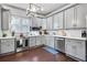 Modern kitchen with stainless steel appliances and hardwood floors at 516 Arthur Sw St, Atlanta, GA 30310